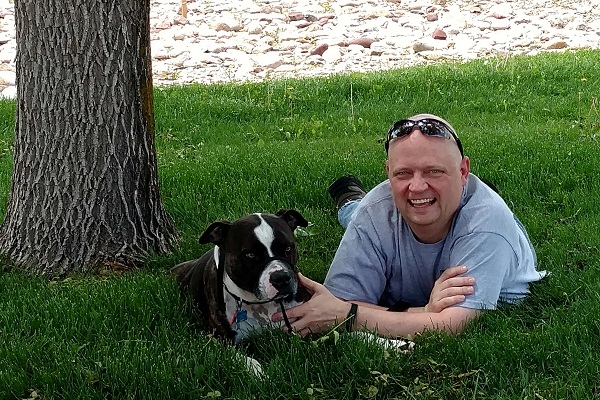 My dog and me laying in the grass